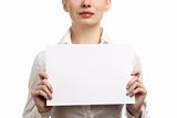 Businesswoman holding a blank page