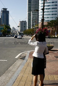 Woman about to cross the street