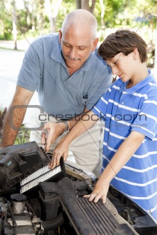 Boy Helps Dad