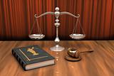 Gavel, scale and law book on the table