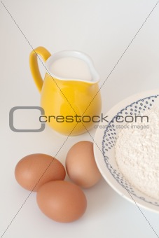 Pitcher of milk, eggs and flour