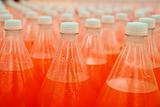 orange juice beverage plastic bottle in factory 