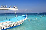 blue boat seagulls Caribbean turquoise sea
