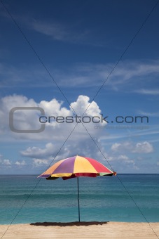 summer time on beach and umbrella