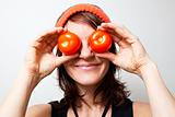 Young woman with tomato eyes