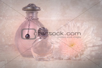 Vintage perfume bottles with flower