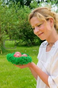 Young woman and easter eggs