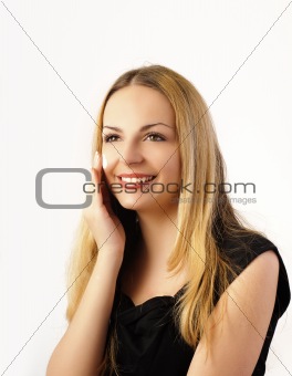Beautiful woman applying moisturizer