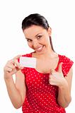 woman in red with card smiling