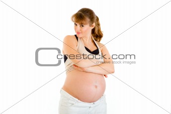 Beautiful pregnant woman  with foxy expression on  faces
