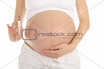 pregnant woman with syringe in hand