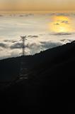 Electricity pylon over valley at sunset, Lomba das Torres,  Madeira island, Portugal