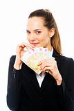 Young businesswoman holding banknotes on white background studio