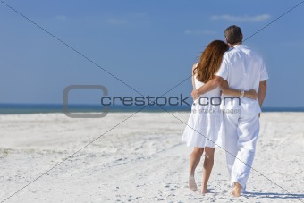 Couple Walking on An Empty Beach