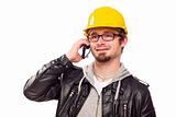 Handsome Young Man in Hard Hat Talking on Cell Phone Isolated on a White Background.
