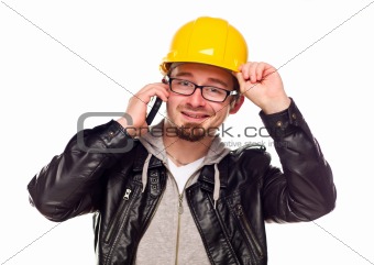 Handsome Young Man in Hard Hat Talking on Cell Phone Isolated on a White Background.
