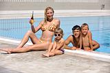 happy young family have fun on swimming pool