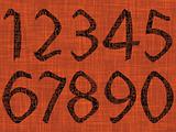 astract numbers over orange texture