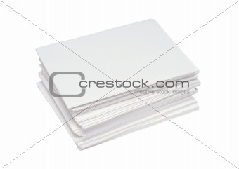 different sized stacks of business cards over white