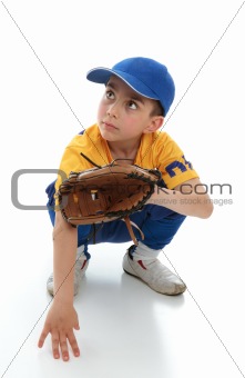 Little boy in baseball T-ball gear