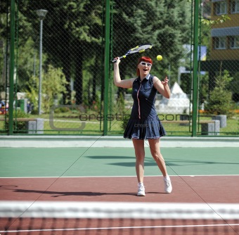 young woman play tennis game outdoor