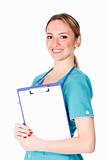 Smiling female doctor holding a clipboard 