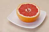 cut red grapefruit