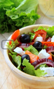 Greek  salad with feta cheese, olives and peppers