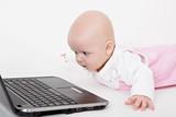 infant with a computer