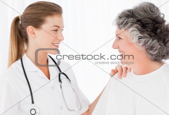Patient with her nurse smiling