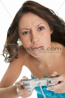 Young woman concentrated on videogame