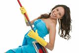 Excited woman having fun while cleaning