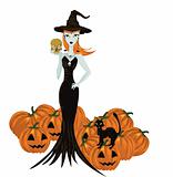 Halloween witch standing with skull and pumpkins 