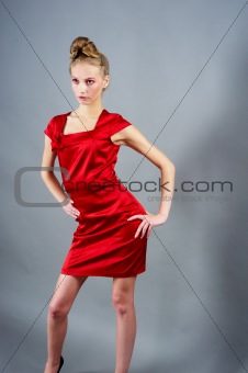 Sexy slim woman in red dress