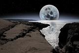 shimmering moon and boulders in rocky burren landscape