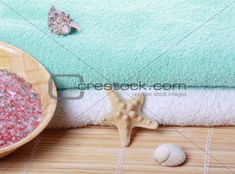 Stack of soft towels with starfish 