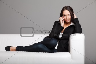 Young woman talking over the phone