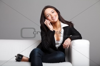 Young woman talking over the phone