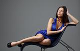 Woman sitting on  chair