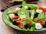Greek  salad with feta cheese, olives and peppers