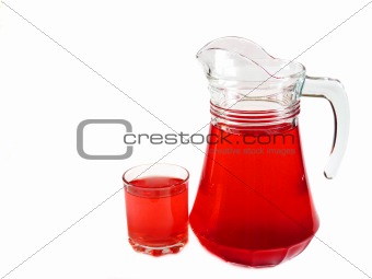 Berry fruit drink in a glass carafe and glass isolated on white background 