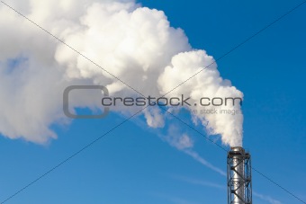 Polluting smoke coming out of chimney 