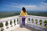 woman at balcony of Toro mountain