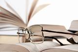 Spectacles on book