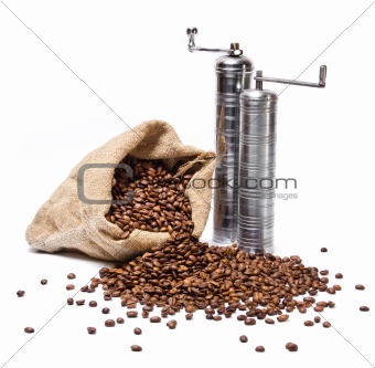 Coffee beans sack with scattered beans and metal coffee-grinders
