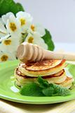 Traditional pancakes with honey and mint