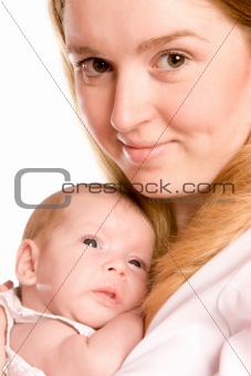mother holding baby