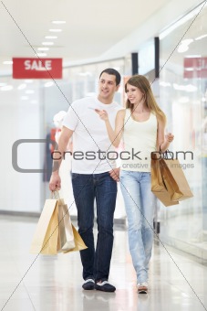 Attractive couple in shop