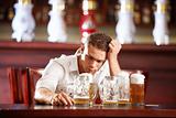 Drunk man in a pub