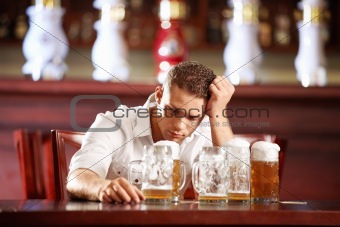 Drunk man in a pub